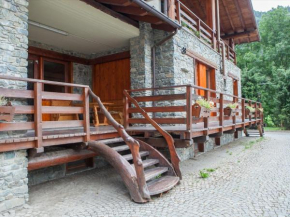 The chalet is situated in a quiet and sunny area of Antey Saint Andr, Antey-Saint-André